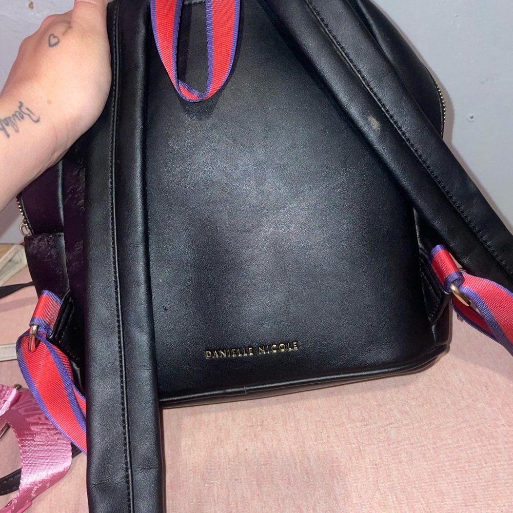 Danielle Nicole Black Backpack with Pink and Blue Accents